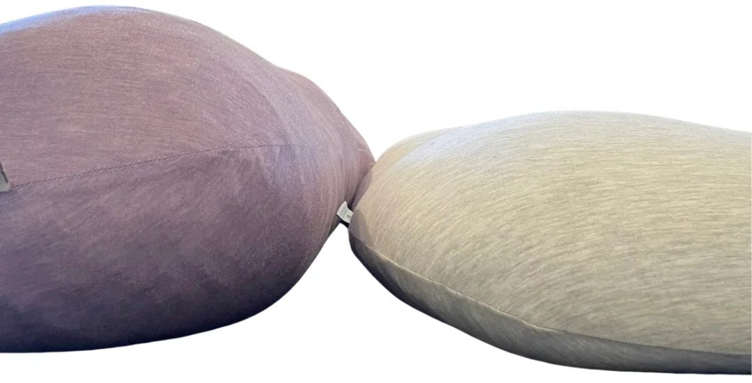 Side by side, same shoot: Araluna in Soft Lilac stands noticeably taller and fuller than a PharMeDoc pregnancy pillow